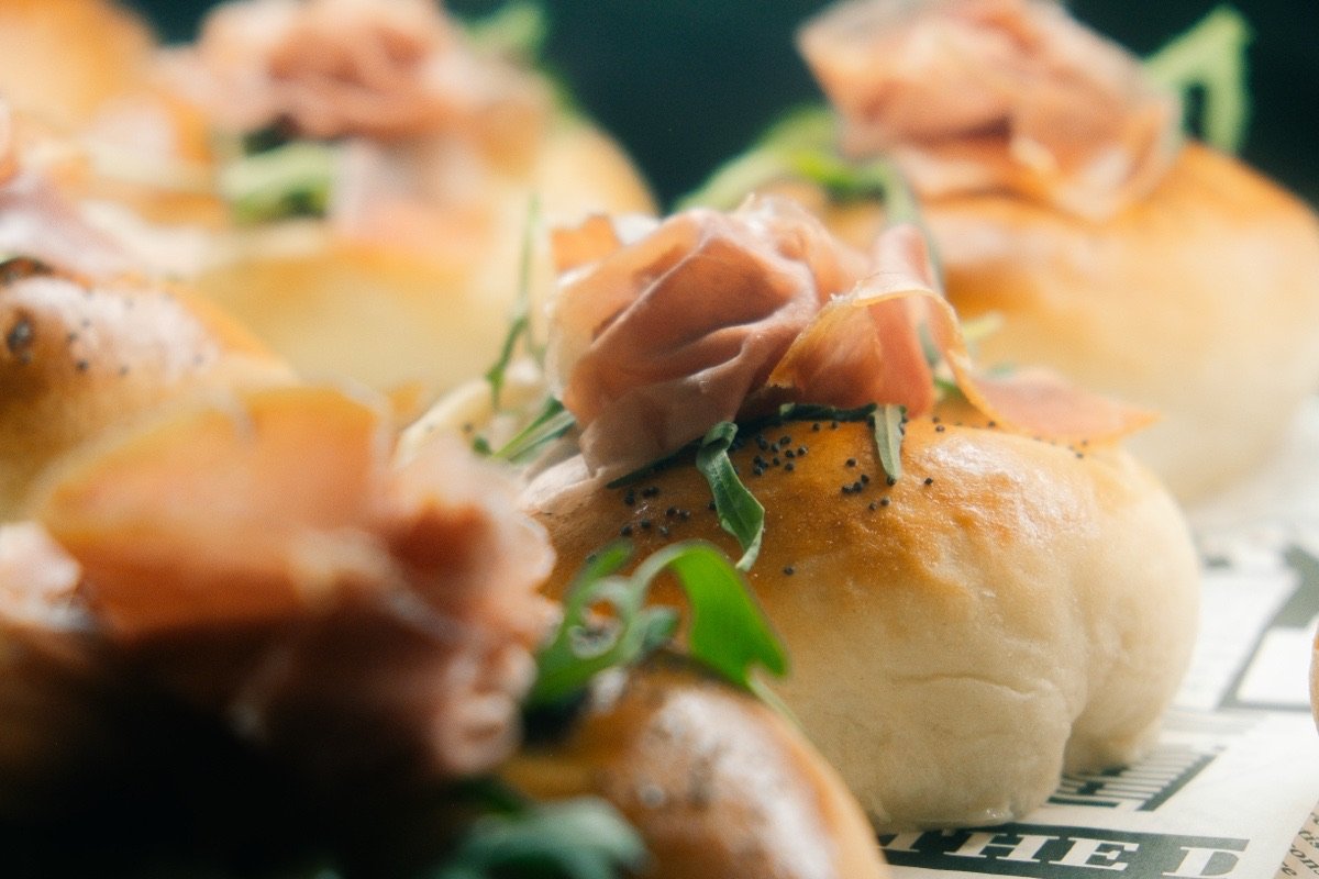 Soft Italian buns topped with Parma ham and fresh rocket